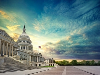 D.C. Capitol Building with radiant sunrise