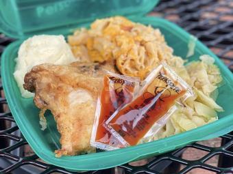 Commons Food (Fried Chicken, chips, mashed potatoes) in green container