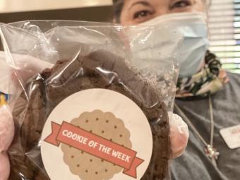 Commons Market Staff with Weekly Cookie