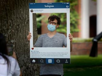 student poses in Instagram image card popup card