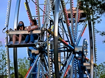 Ferris Wheel on Campus for Mini Break with Students in Masks