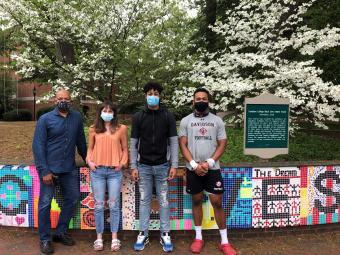  Byron McCrae and Adelle Patten ’21, Israel Palencia ’23 and T.J. Elliott ’21 in Front of BLM Mural