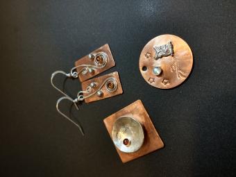 Copper earrings and pendants by Ellen Morrissey