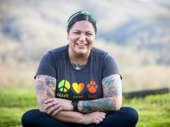 Dr. Blythe Wincester '99 in front of NC Mountain Landscape