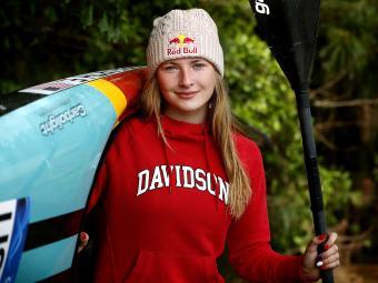Davidson Olympian Evy Leibfarth '25 headshot with kayak and paddle