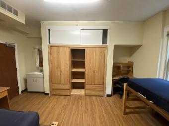 Photo of wardrobe and sink in a room in Belk Hall