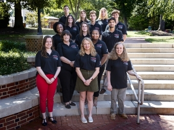 College advising corps employees gather for a group shot outside