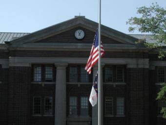 Davidson College U.S. flag at half-mast on 9/11/2021 in front of Chambers building 