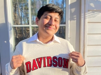 Recently admitted class of 2021 shows off his new Davidson sweatshirt