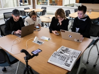 Digital Learning team in the library gather at an event