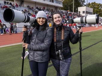 Claire and Sydney, Photographers with Big Lenses and cameras