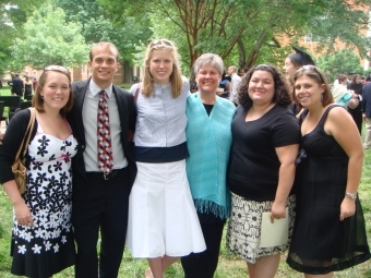 Ruth Pittard with group of Davidson students on campus lawn 