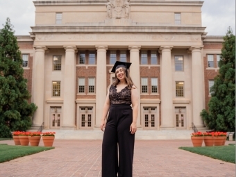 Chloe deBeus ’21 in front of Chambers Building
