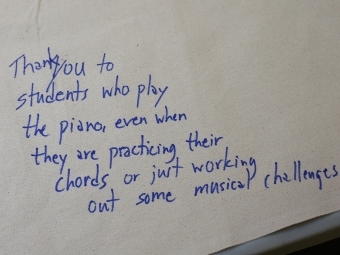 A thank you note that reads "Thank you to students who play the piano even when they are practicing their chords or just working out some musical challenges."