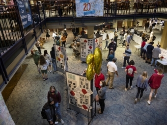 crowd of people in Alvarez College Union for 20th anniversary celebration