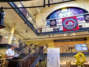 decorations, including college flags and balloons, for the celebration