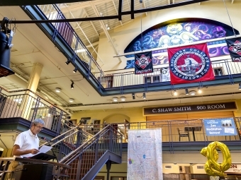 decorations, including college flags and balloons, for the celebration 