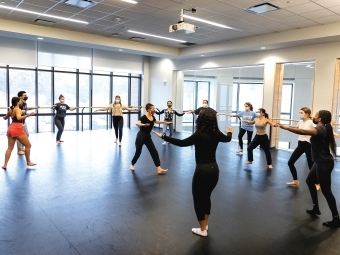 Professor Dasha Chapman teaching a Haitian dance class 