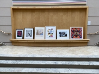 artwork laid out on bench in Visual Arts Center