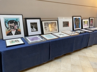 artwork laid out on table