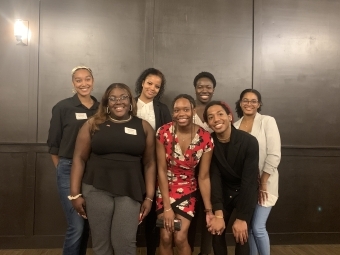 group of Msaada mentees standing and smiling at camera