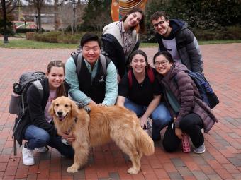 Random Acts of Kindness Day Students with dog