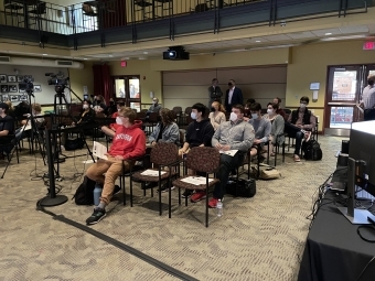 students seated in 900 room for the event 