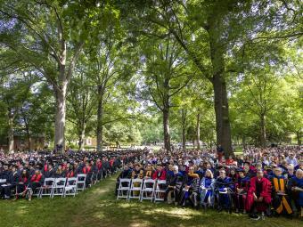 commencement lawn of students, faculty and family 