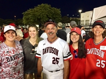 Dick and Susan Cooke with their children at a game