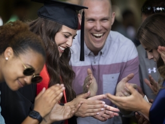 Group of people applauding at Class of 2022 Commencement