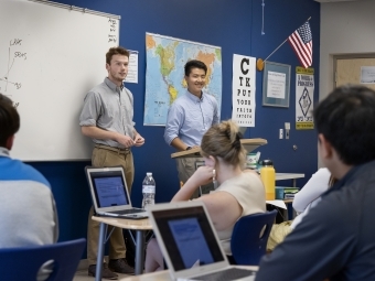 Students teach high school economics class