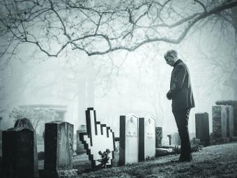 Death in the digital age image of man looking at graveyard