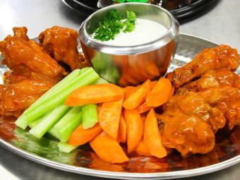 Chicken wings, carrots and celery
