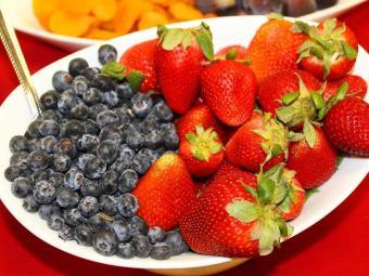 blueberries and strawberries on a plate