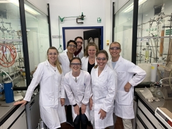 Group of people in lab coats