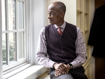 Philip Jefferson looking out window