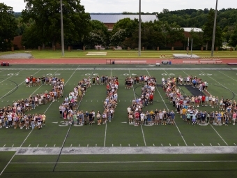 Class of 2026 on Field in shape of "2026"