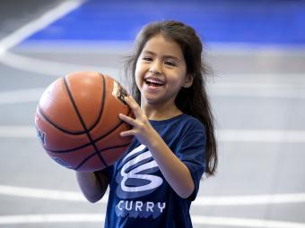 Girl holding a basketball