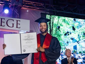 Steph Curry receives diploma during Curry for 3 event