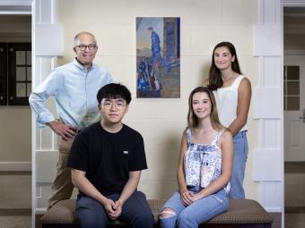 Biology Professor Dave Wessner with students David Peng '22 and Cathleen Krabak '23 (seated) and Nella Tsudis '23, surrounding “El Extranjero” by artist Delia Cugat.