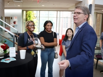 Students with President Doug Hicks 