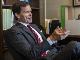 Grier Martin seated at desk