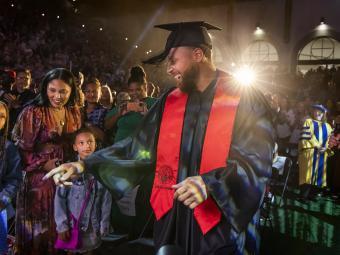 Curry for 3 Event—Stephen Curry in cap and gown for his commencement