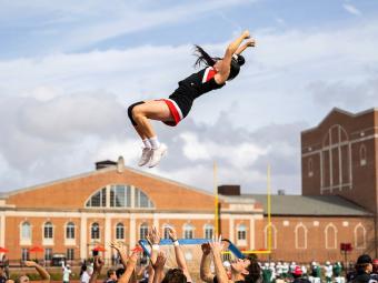 Cheerleader flying high