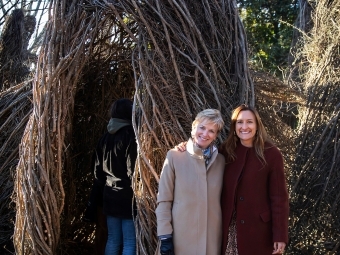 Artist Malú Alvarez ’02 in front of Common Ground sculpture