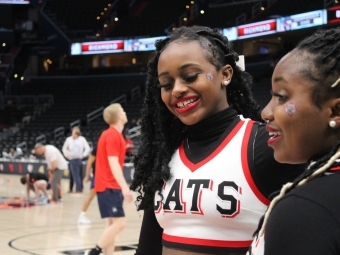 Bernice Saladin '24 Cheerleading at a game