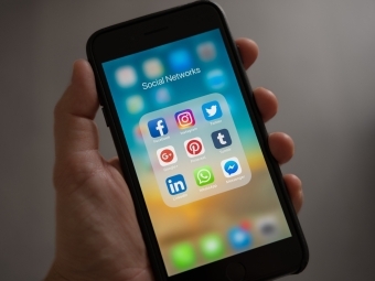 Phone screen with social icons