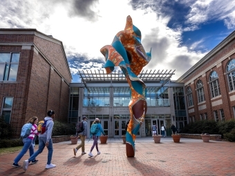 Students changing classes at the Wall Center