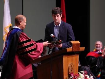 Student receiving award at convocation