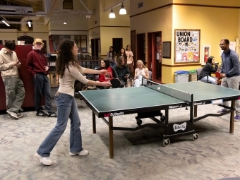 Students playing ping pong